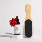 A bottle of Maundy's callus remover and a paddle