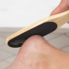 Linda using the paddle with Maundy’s All-Natural Callus Remover